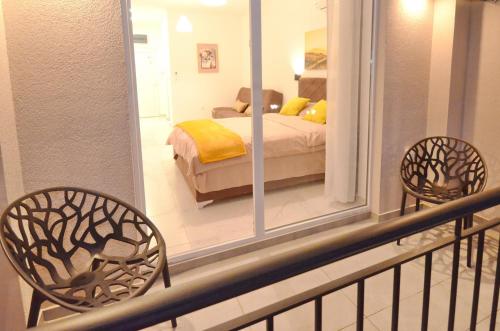 Postel nebo postele na pokoji v ubytování Residence Spa Apartments DUB