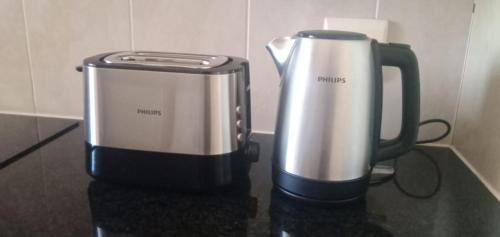 two blenders sitting on top of a counter at Bougain Villas in Cape Town