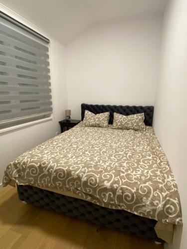 Katil atau katil-katil dalam bilik di Filmski grad Apartmani