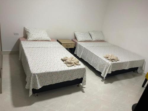 Lova arba lovos apgyvendinimo įstaigoje Apartamentos amueblados, zona céntrica-Cisneros- antioquia