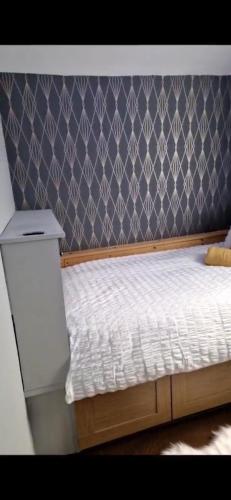 Ένα ή περισσότερα κρεβάτια σε δωμάτιο στο The Griffen Lodge