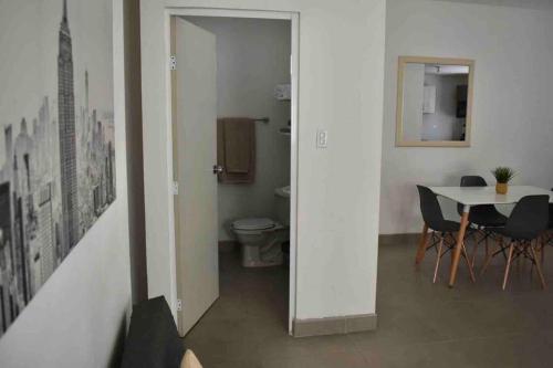 a room with a table and chairs and a dining room at Gabby’s Accesible House in Private area in Mexicali