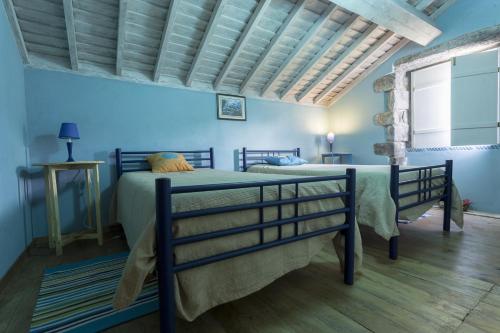 Krevet ili kreveti u jedinici u objektu Casa dos Platanos-Family Home