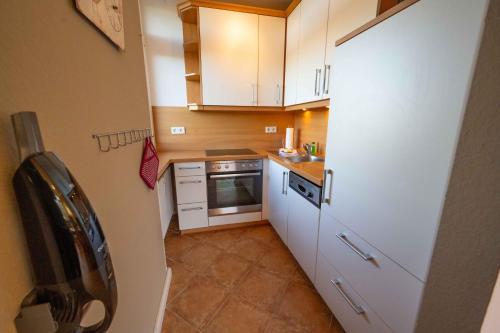 Η κουζίνα ή μικρή κουζίνα στο Haus Oland Wohnung 20