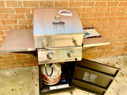 a coffee maker with a box on top of it at New! Close To Beach, Cozy, New beds & Family Friendly in Navarre