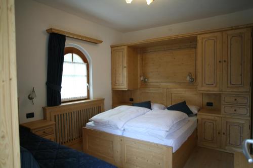 Posteľ alebo postele v izbe v ubytovaní B&B Rendena Chalet