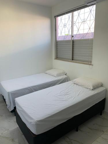 Lova arba lovos apgyvendinimo įstaigoje Solar Poranga