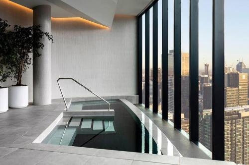 a swimming pool on the side of a building at Luxury 3 Bed 2 Bath + car park at Melbourne Square in Melbourne