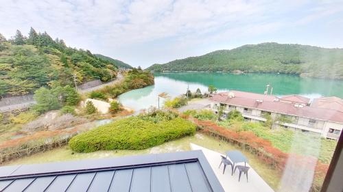 an aerial view of a river from a house at H,U,B Unzen - Vacation STAY 74185v in Unzen