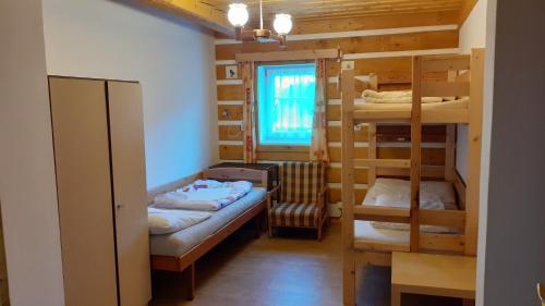 Postel nebo postele na pokoji v ubytování Apartmán U Pekařů