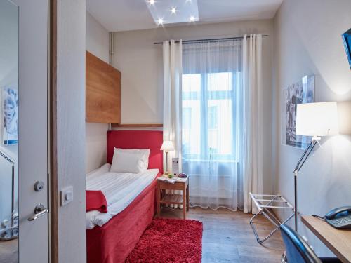 Voodi või voodid majutusasutuse Hotell Stadsparken toas