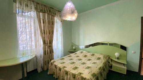 Postel nebo postele na pokoji v ubytování Дом Писателей Цахкадзора