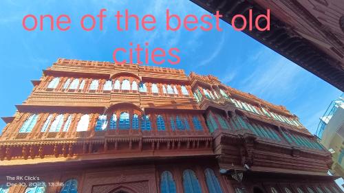 one of the best old cities written on top of a building at Karina art Home stay in Bikaner