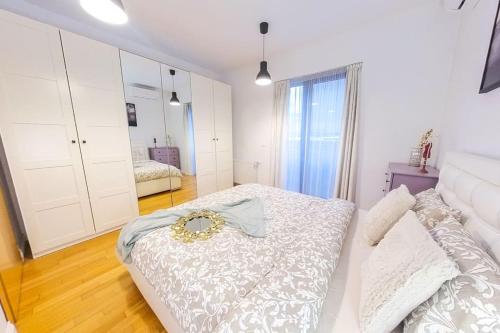 Postel nebo postele na pokoji v ubytování Old Town Spacious Apartment