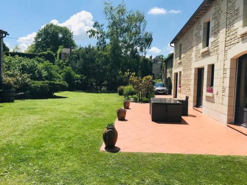 Κήπος έξω από το Gîte AU BOOM COEUR forfait Spa et Petit déjeuner inclus