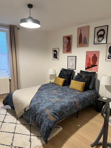 Postel nebo postele na pokoji v ubytování L’escapade moulins