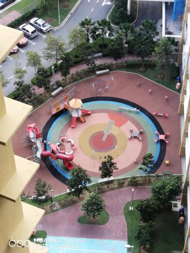 an aerial view of a park with a playground at KASTURI GUEST HOUSE PUTRAJAYA in Putrajaya