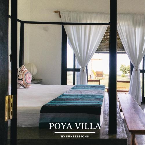 Postel nebo postele na pokoji v ubytování Poya Villa Ahangama
