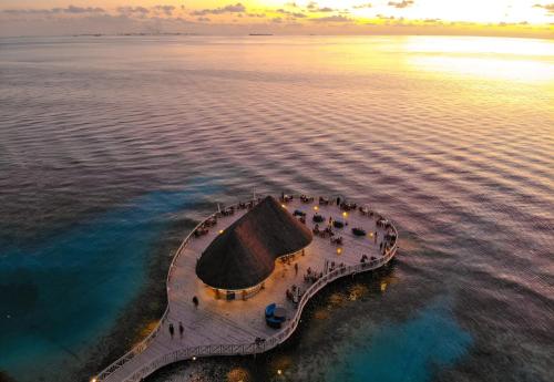 an island in the middle of the ocean at Bandos Maldives in North Male Atoll