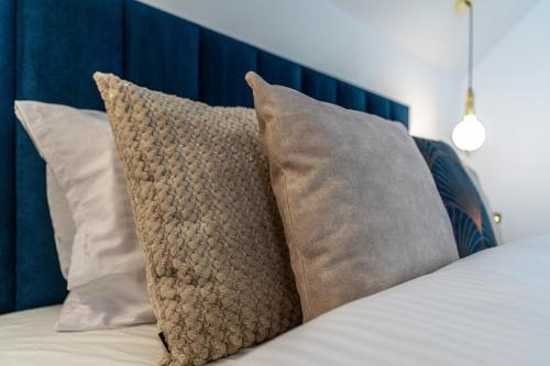 Katil atau katil-katil dalam bilik di Apartamenty Przełom Białki - plac zabaw, wiata grillowa