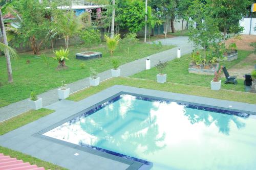 Bazén v ubytování Sayu Garden Hotel nebo v jeho okolí