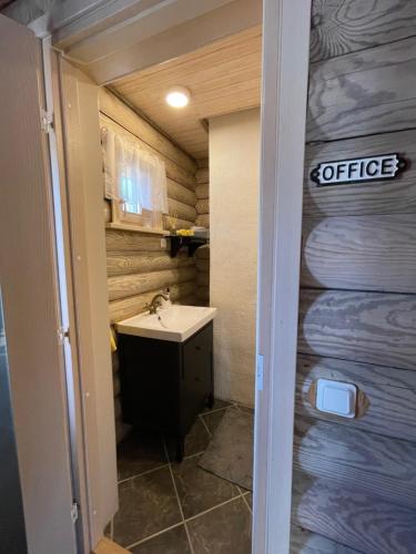 a small bathroom with a sink and a toilet at Villa Uuekadaka in Põhja