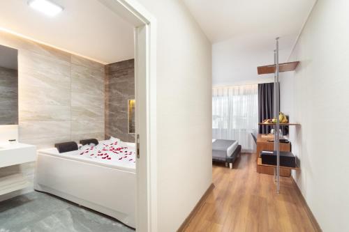 Postel nebo postele na pokoji v ubytování Nish Suites Atasehir