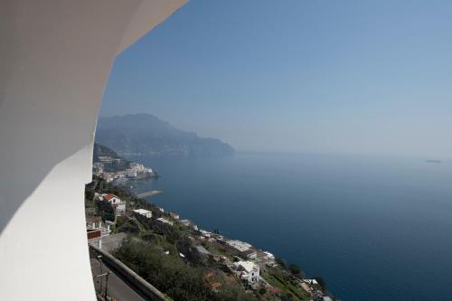 a view of the amalfi coast from positano at Hotel Villa Felice Relais in Amalfi