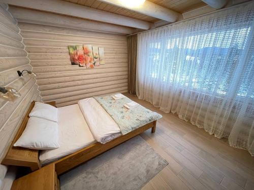 Ένα ή περισσότερα κρεβάτια σε δωμάτιο στο Horizon Apartmens