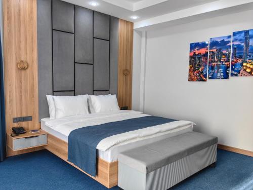 Katil atau katil-katil dalam bilik di Shymkent Park Hotel