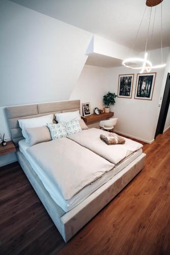 a bedroom with a large bed in a room at Jamy House in Habovka