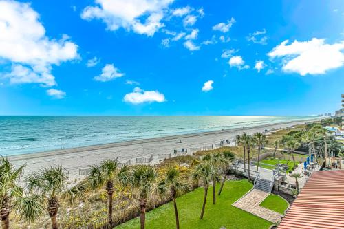 a view of the beach from the balcony of a resort at Couples Retreat 409 in Myrtle Beach