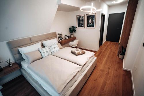 a bedroom with a large bed in a room at Jamy House in Habovka