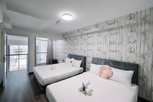 Katil atau katil-katil dalam bilik di NEW Maritime Luxury Pool View Duplex Suite 601