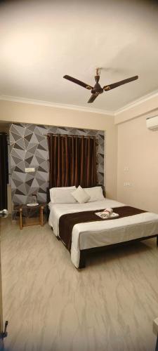 Katil atau katil-katil dalam bilik di Cochin Hotel Inn