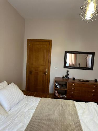 Una cama o camas en una habitación de Villa Malo Guesthouse