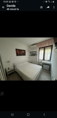 Una cama o camas en una habitación de B&B metro B fronte metro