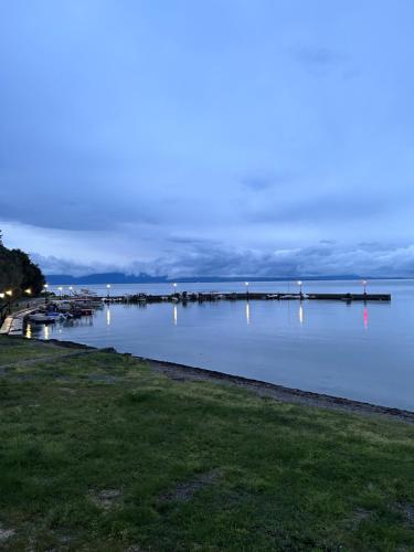 a view of a body of water with a dock at Ambracian Gulf Comfort House in Menídion
