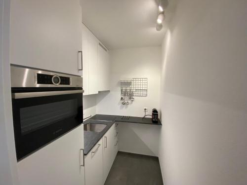 Kuchyň nebo kuchyňský kout v ubytování Apartment Apollo Horu 19