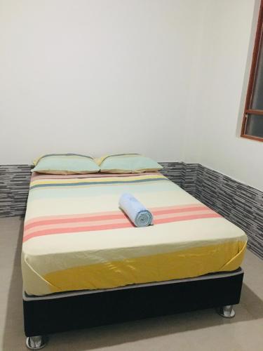 Giường trong phòng chung tại Munaycha