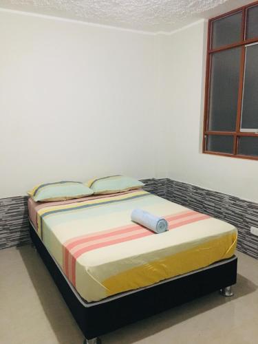 Ліжко або ліжка в номері Munaycha