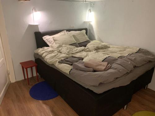 Tempat tidur dalam kamar di Central by lejlighed