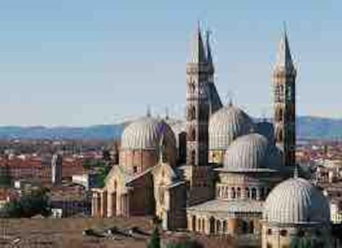 a large building with domes on top of a city at @HOME - Mini In Centro Storico in Padova