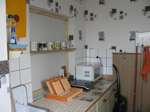 Kuchyň nebo kuchyňský kout v ubytování Bungalow in Altglietzen für 2 Personen und 1 Kind bis 6 Jahren