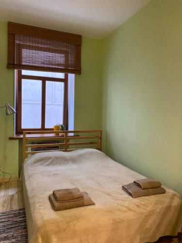 Postel nebo postele na pokoji v ubytování Studio Apartment Old Town