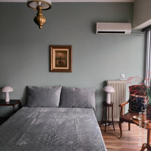 Postel nebo postele na pokoji v ubytování Central Sophisticated Studio Pyrgos near Olympia