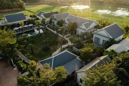 an overhead view of a row of houses with roofs at Le Chanthou Boutique in Siem Reap