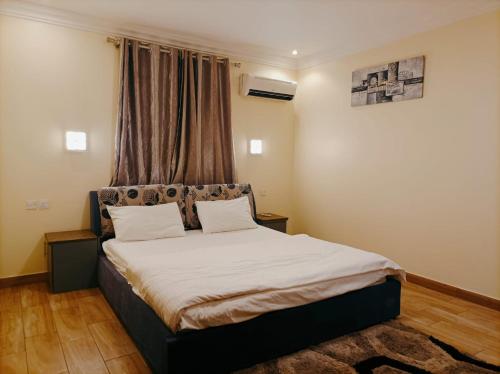 Кровать или кровати в номере لاكاسا للشقق السكنية /Lacasa Apartments