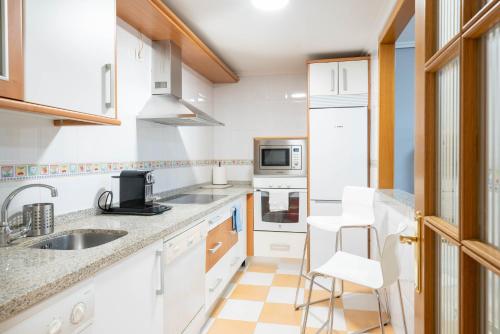 Η κουζίνα ή μικρή κουζίνα στο Apartamento GO- La Ermita -Parking Gratuito