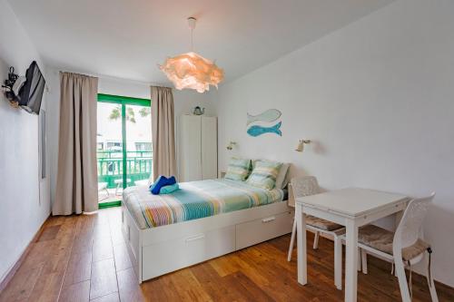 Postel nebo postele na pokoji v ubytování Vivienda Vacacional Paradise